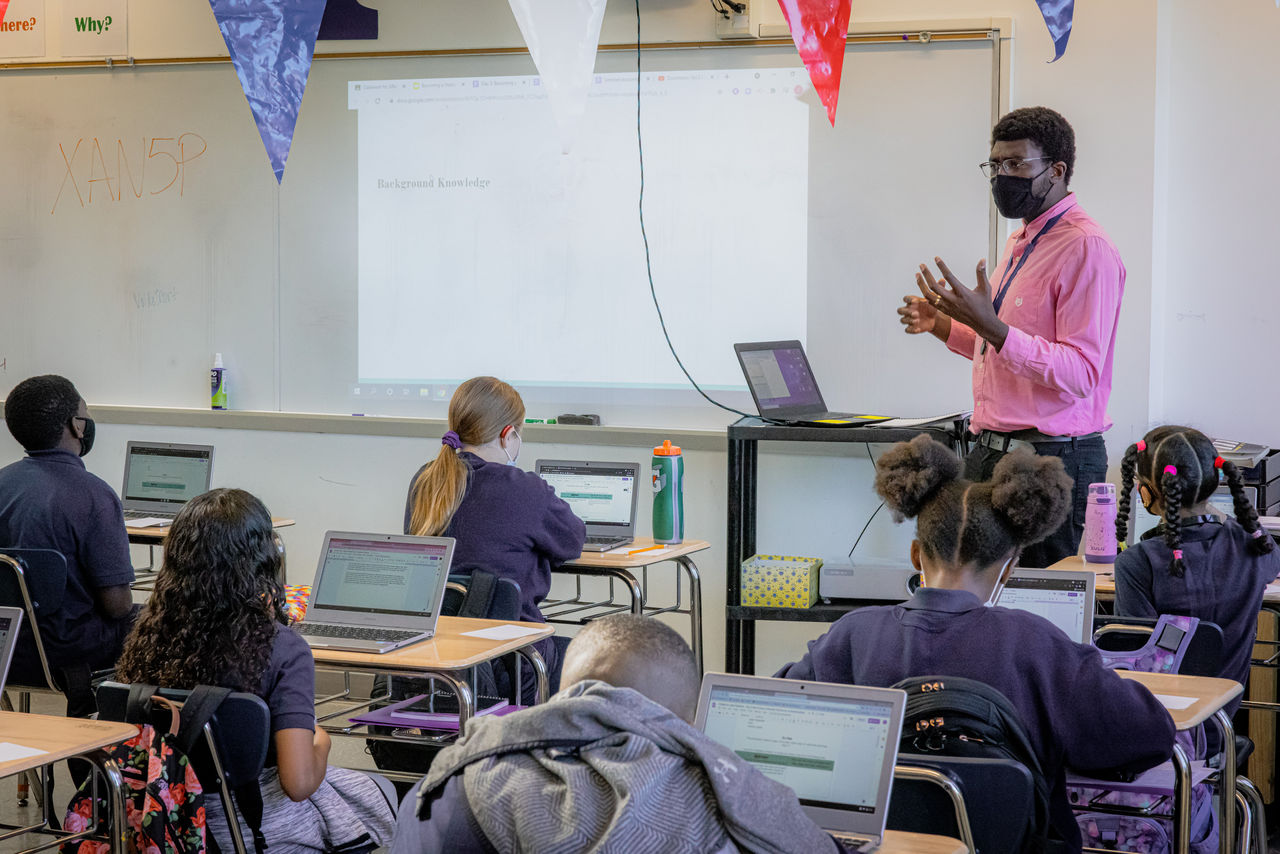 Teacher and students in the classroom