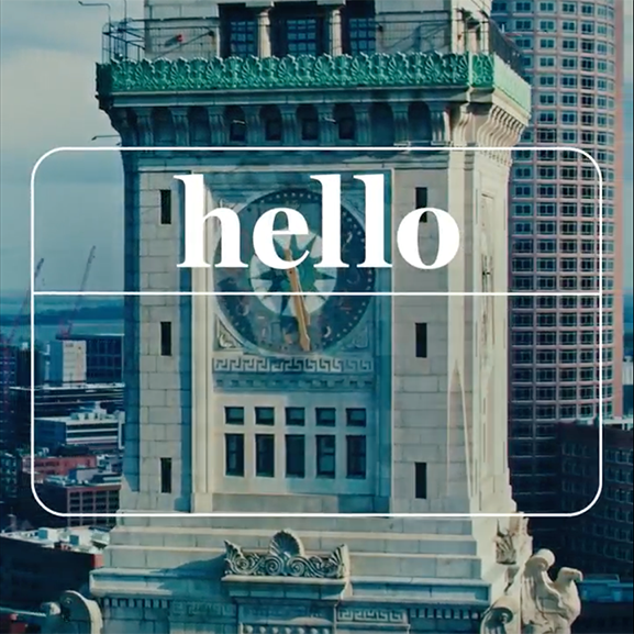 Man and woman shaking hands in conference room