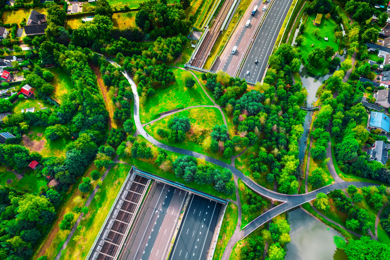 Drone photo of a green bridge park highway in the Netherlands